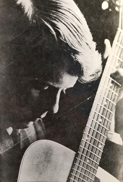 John with guitar